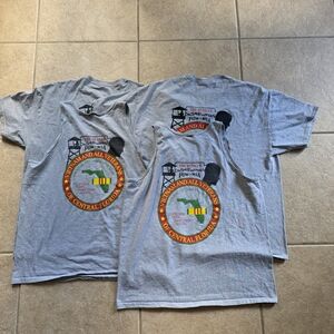 4 gray T-shirts with a graphic print on the back dedicated to Central Florida Vi